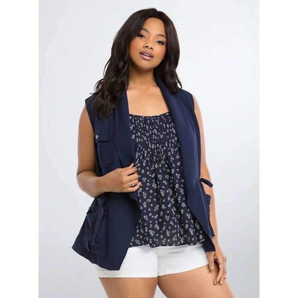 Never worn. Tag fell off. Torrid linen vest